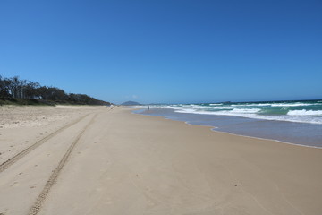 Sandy beach of Sunshine Coast in summer in Queensland, Australia 