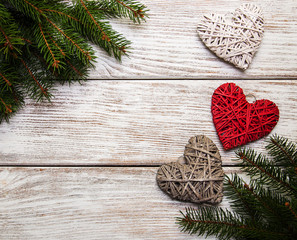 Christmas tree branches with heart decoration
