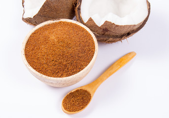 Coconut with coconut sugar isolated on white background.