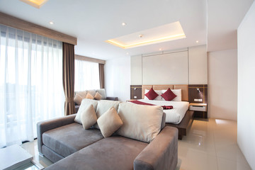 Luxury Interior design in bedroom of pool villa with cozy king bed