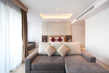 Luxury Interior design in bedroom of pool villa with cozy king bed