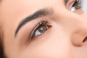 Young woman with eyelash loss problem, closeup