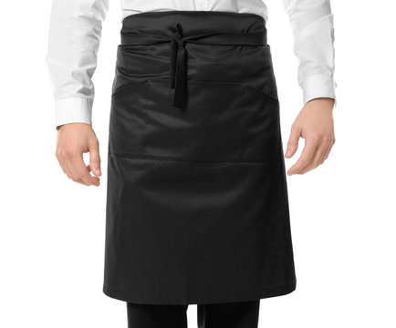 Waiter in black apron on white background