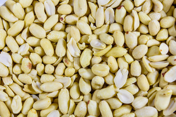 Texture of peeled roasted peanuts for the background