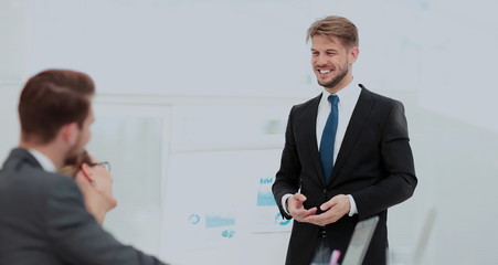 Fototapeta premium Successful business presentation of a man at the office