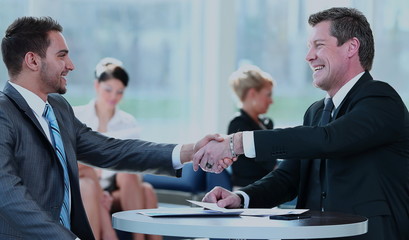 Concept of partnership - handshake of business partners