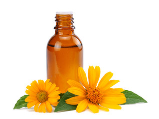 aromatherapy essential oil with marigold flowers isolated on white background