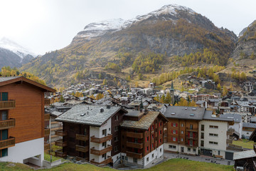 Fototapeta na wymiar Zermatt Switzerland during Autumn season with snow on top of mountain