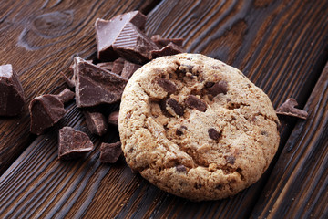 Chocolate cookies on wooden table. Chocolate chip cookies.