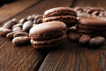 Sweet and colourful french macaroons or macaron on wooden background, Dessert