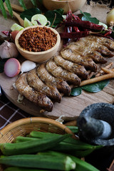 Assortment of Thai food Cooking ingredients. Spices ingredients chilli pepper garlicgalanga and kaffir lime leaves.