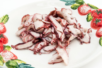 Delicious Octopus Carpaccio on the plate. Seafood appetizer.