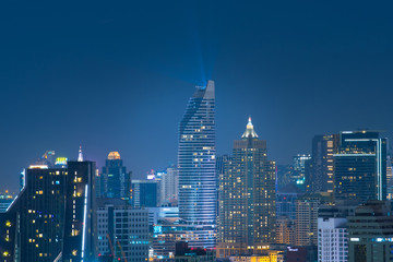 Fototapeta na wymiar Bangkok city skyline, downtown, business district, hotel, residential building and office building at night.