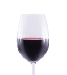A glass of red wine is isolated on a white background