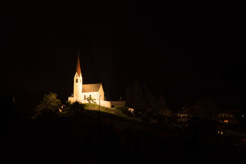 Heiliger Antonius Church on top of the hill. Chapel on the mountain in evening light. Austria, Europe