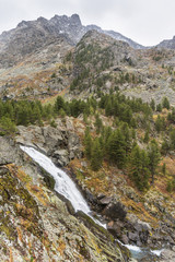 Kuiguk waterfall. Altai mountains autumn landscape.