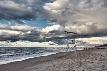 Beautiful coast and beach of the Baltic Sea in winter autumn time. Klaipeda region, Lithuania. View tower