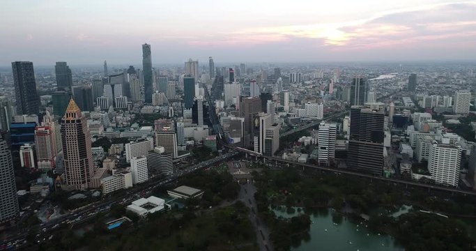 BANGKOK, THAILAND, MARCH 2017: Aerial view over Central Bangkok and Lumpini park at sunset