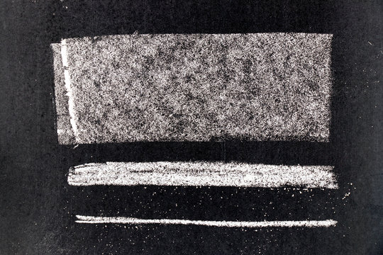 Set of grunge white chalk art brush in square line shape on black board background. Decoration and design element