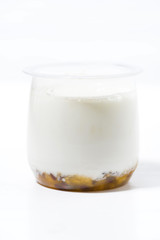 yoghurt in a jar with fruit puree, vertical