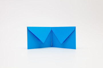 Blue envelopes and on the white desk