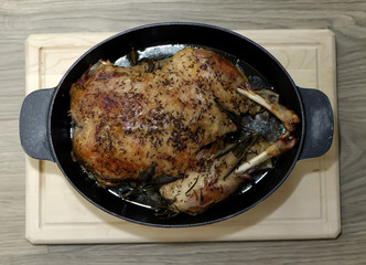 food St. Martin's Day goose whole bird in baking pan detail