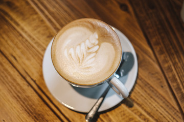 top view latte art on wooden table