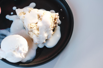 Apple crumble with scoop of vanilla ice cream