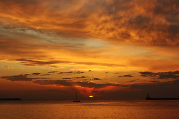 Beautiful sunset with dramatic sky on the sea