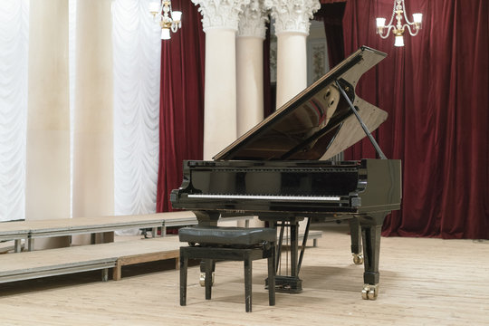 Black Grand Piano On Stage