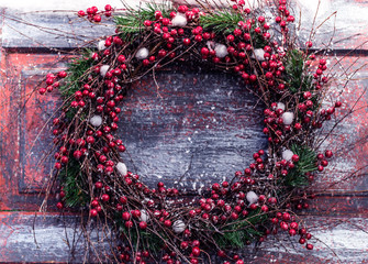 Christmas wreath on dark background with copyspace
