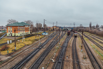 Fototapeta na wymiar Aerial view to railway trucks. Railroad junction 
