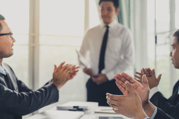 Businessman shake hands agree deal of big lot sales that finish goal of marketing plans of the company