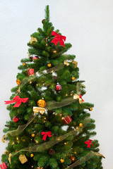 Christmas tree with red and golden decorations