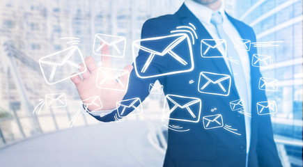 Businessman touching technology interface with professional email  icon