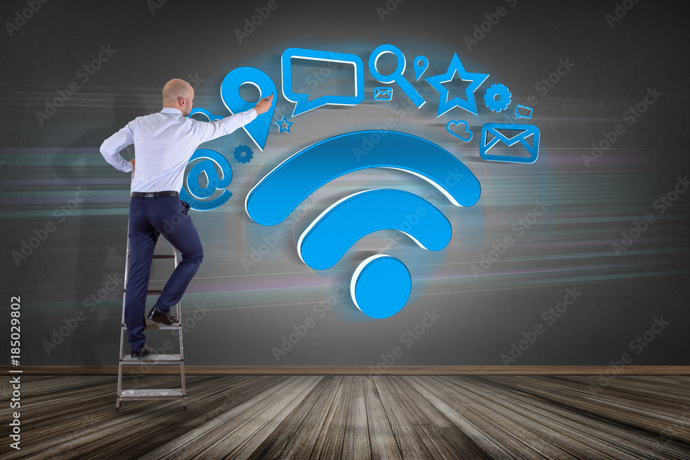 Poster Businessman in front of a wall with wifi symbol connection surrounded by multimedia and internet application logo - 3d rendering