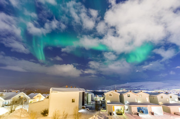 the polar lights over the city of Tromso