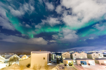 the polar lights over the city of Tromso