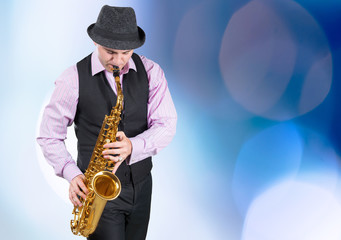 Fototapeta na wymiar professional saxophonist close up