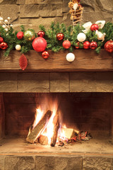 New Year / Christmas tree with colorful festive decorations on the fireplace - 185032283