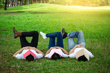 Group of peoples sleep with book on face because of study hard