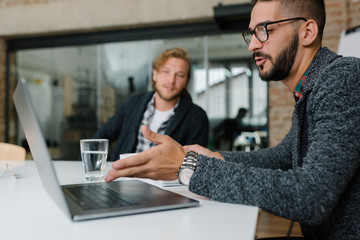 Company recruiter showcasing job responsibilities at a job interview