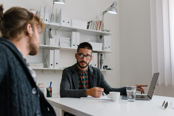 Fototapeta premium Company recruiter investigating details in candidate's resume