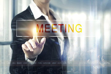 Business women touching the meeting screen