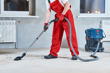 building cleaning service. dust removal with vacuum cleaner