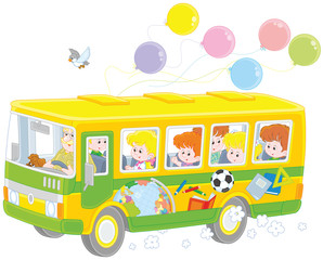 Little children riding a school bus