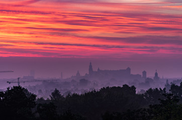 Krakow, Poland, Wawel castle silhouette at colorful sunrise