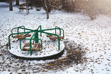 Children's carousel which is buried in the snow