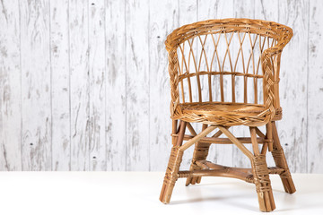 Rattan chair and furniture on concrete floor