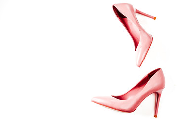 Beauty blog concept. pink nude female shoeson white background. Flat lay, top view trendy fashion...